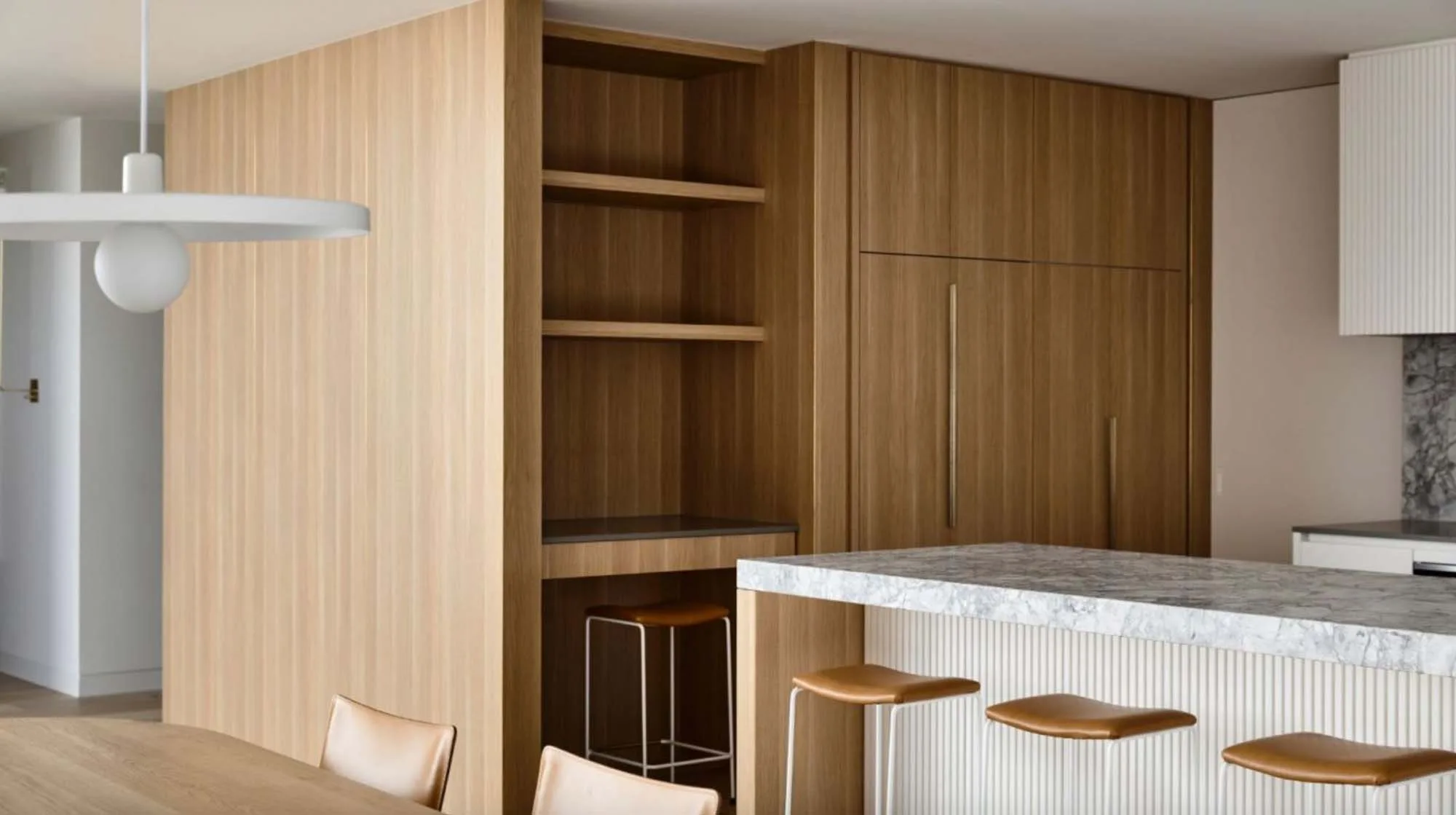 Brighton East Garden House — Timber kitchen cabinetry and island seating
