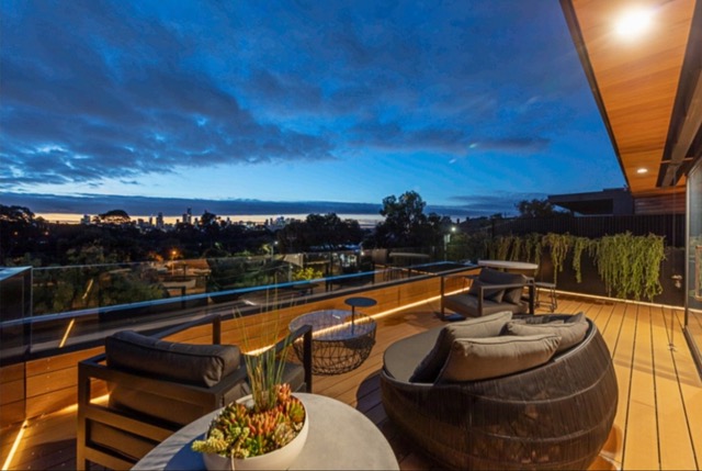 Verdant Avenue, Toorak — Deck with city views at dusk