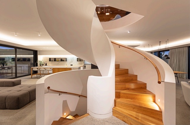 Verdant Avenue, Toorak — Curved timber staircase and living area